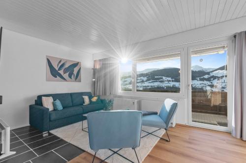 Un lugar para sentarse en Top Aussicht mit Poolbereich in Skiregion Brigels