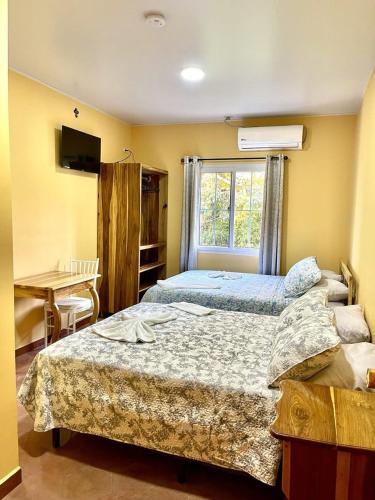 Postel nebo postele na pokoji v ubytování Hotel Virgen De Fatima