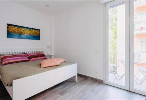 Ένα ή περισσότερα κρεβάτια σε δωμάτιο στο Annita's Rooms