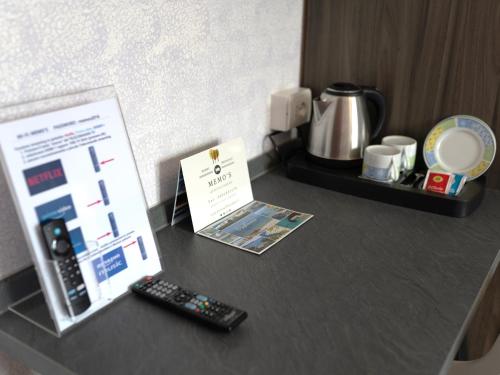 MEMO'S Affittacamereにあるコーヒーまたはお茶