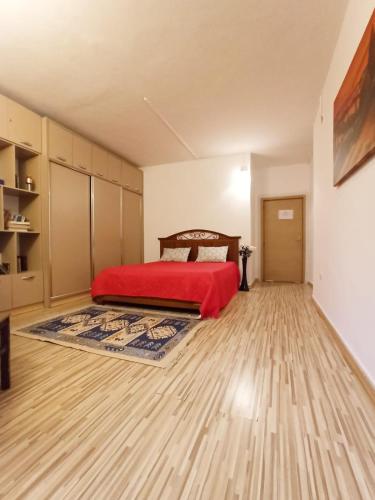 Postel nebo postele na pokoji v ubytování Skanderbeg Square Residences