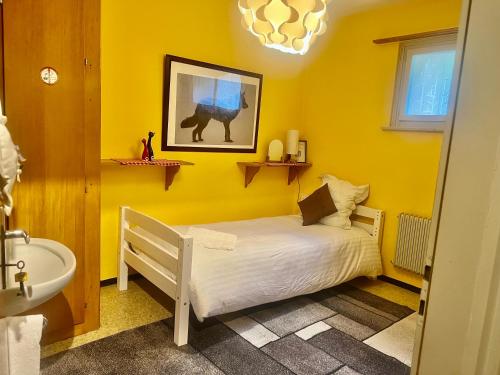 Voodi või voodid majutusasutuse Hotel l'escale toas