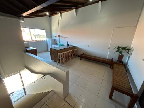 an aerial view of a living room and dining room at Complexo Brisa Ferrugem in Garopaba