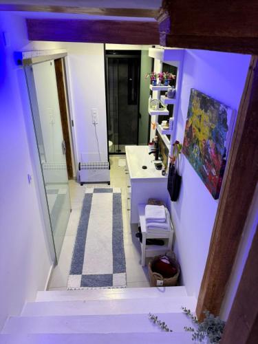 a room with a hallway with a painting on the wall at Ziv Boutique Apartments Town Square II in Lefkada Town
