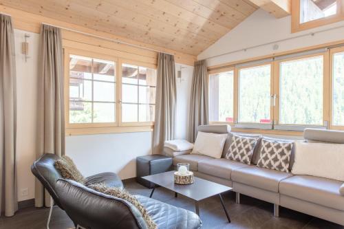 Posezení v ubytování ESCAPE Chalets
