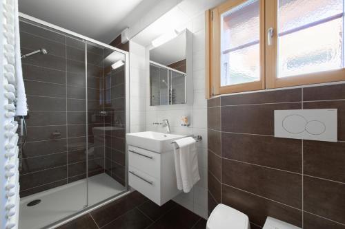 Koupelna v ubytování ESCAPE Chalets