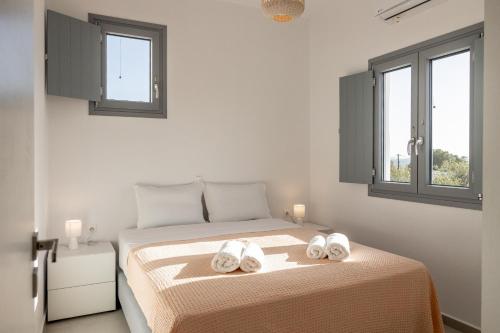 Ένα ή περισσότερα κρεβάτια σε δωμάτιο στο Mouragio Stay