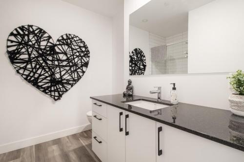 Kuchyň nebo kuchyňský kout v ubytování Le Panorama - Parking gratuit - Toit terrasse