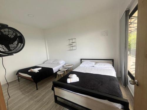 Postel nebo postele na pokoji v ubytování Curazao Natural Living