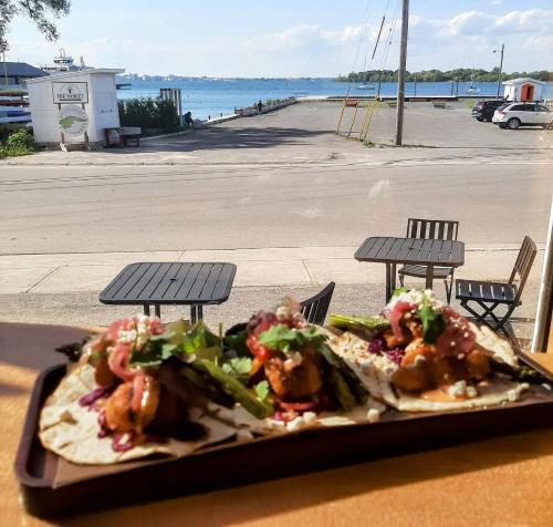 a plate of food sitting on top of a table at Hotel Wolfe Island in Marysville