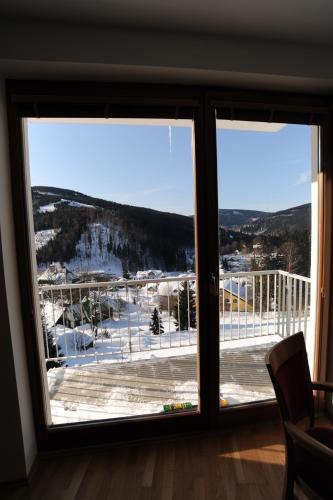 a view from the window of a room at Apartmán 3K Michael in Špindlerův Mlýn