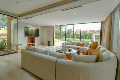 Posezení v ubytování Villa d'exception spa, sport & piscine