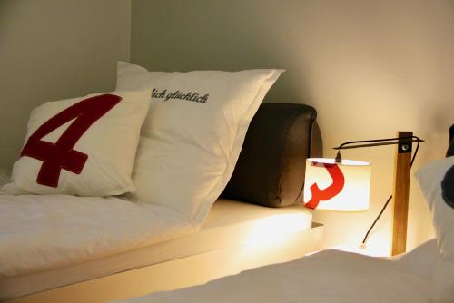 Katil atau katil-katil dalam bilik di Ferienhaus " Sealounge " an der Ostsee, Sauna, Strandkorb, free W-LAN - SEASIDE -