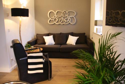 Ruang duduk di Ferienhaus " Sealounge " an der Ostsee, Sauna, Strandkorb, free W-LAN - SEASIDE -