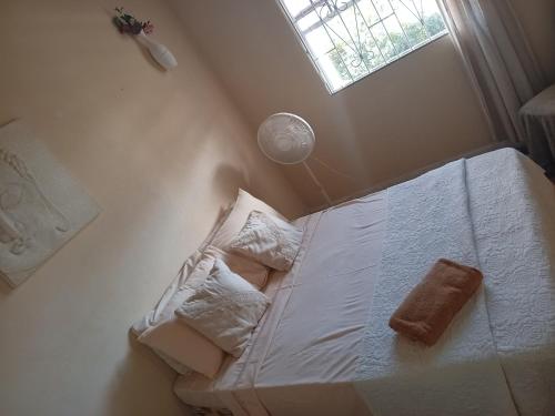Postel nebo postele na pokoji v ubytování Chandler Homestay