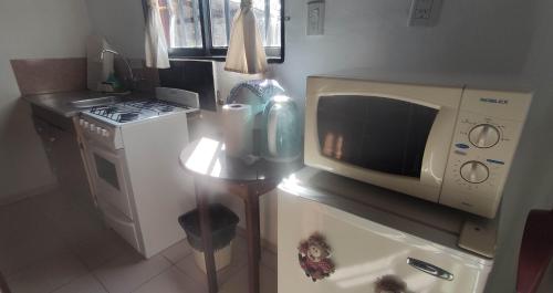 Kuchyň nebo kuchyňský kout v ubytování Cabañas La Morada