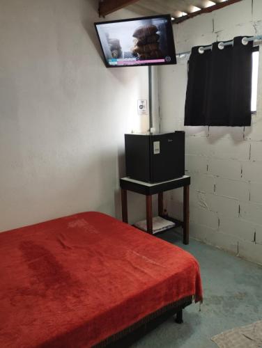 Φωτογραφία από το άλμπουμ του Suite com estacionamento privativo próximo a praia σε Πράια Γκράντε