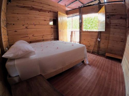 Postel nebo postele na pokoji v ubytování Eco hotel Mar De Ensueño