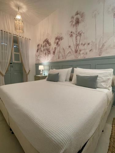 Ένα ή περισσότερα κρεβάτια σε δωμάτιο στο Axagua Hotel Boutique