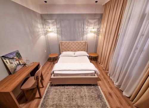 Ένα ή περισσότερα κρεβάτια σε δωμάτιο στο Villa Mishel