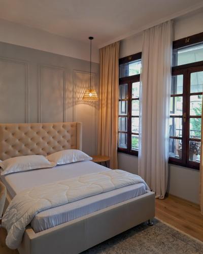 Ένα ή περισσότερα κρεβάτια σε δωμάτιο στο Villa Mishel