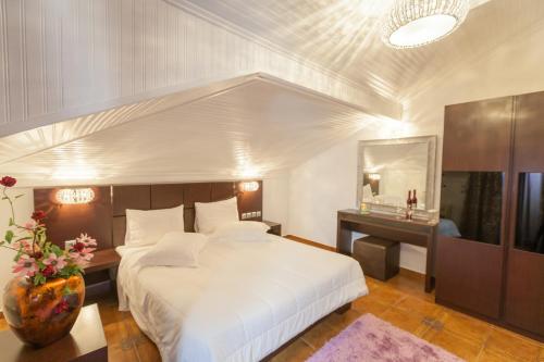Postel nebo postele na pokoji v ubytování Chalet Castello