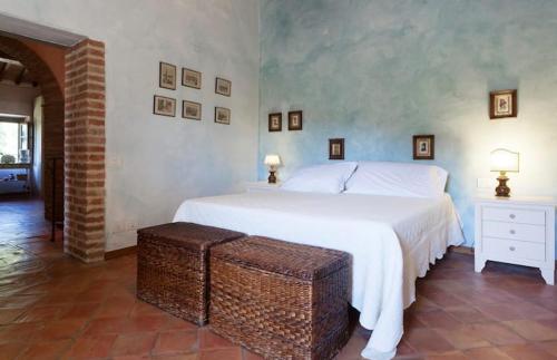Ένα ή περισσότερα κρεβάτια σε δωμάτιο στο CHARM VILLA Tuscany