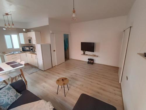 Kuchyň nebo kuchyňský kout v ubytování Appartement au bord de l'océan