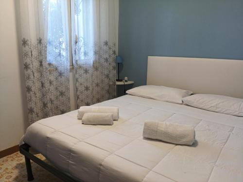Postel nebo postele na pokoji v ubytování Casa Fronte Mare