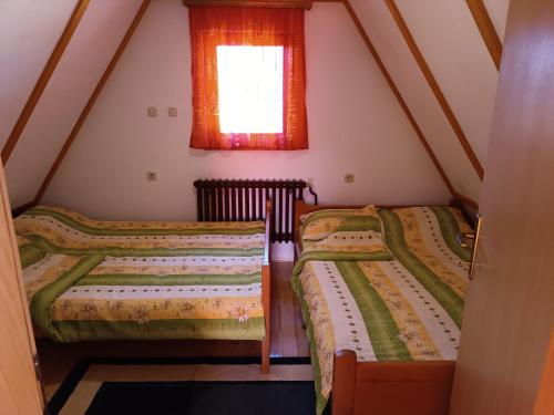 Katil atau katil-katil dalam bilik di Apartmani ( VILA ) Vucko