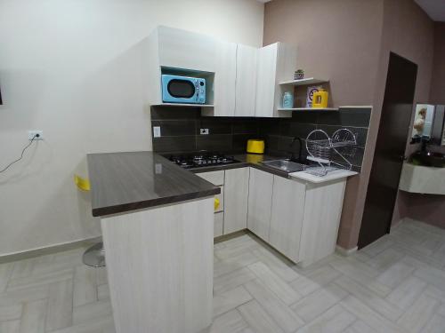 Η κουζίνα ή μικρή κουζίνα στο Sweet Home at Juarez