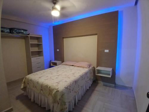 Ένα ή περισσότερα κρεβάτια σε δωμάτιο στο Sweet Home at Juarez