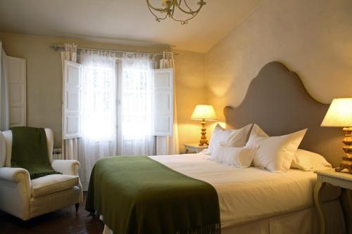 Postel nebo postele na pokoji v ubytování House of Jasmines Relais & Châteaux