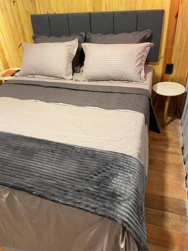 Ένα ή περισσότερα κρεβάτια σε δωμάτιο στο Container Dos Sonhos
