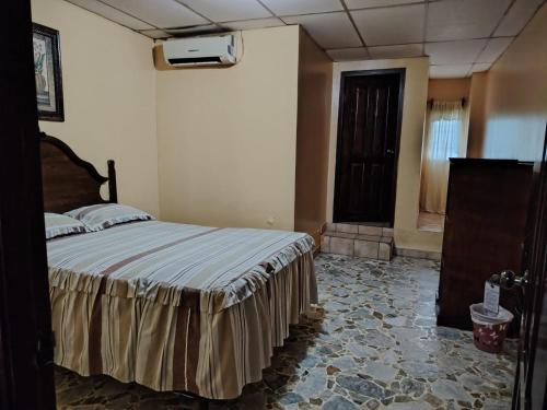 Postel nebo postele na pokoji v ubytování Hotel Senderos Maya