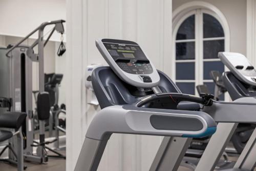 a row of exercise bikes in a gym at Deluxe Union Square Suites in San Francisco
