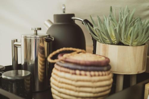 a group of cookies on a table with a bottle of soap at Oso Tipi at El Mistico Ranch in Nogal
