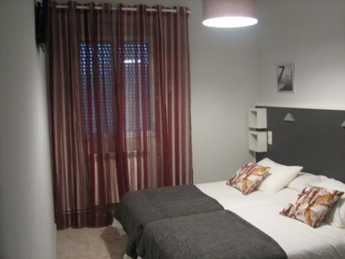 Katil atau katil-katil dalam bilik di Hostal Meson do Loyo