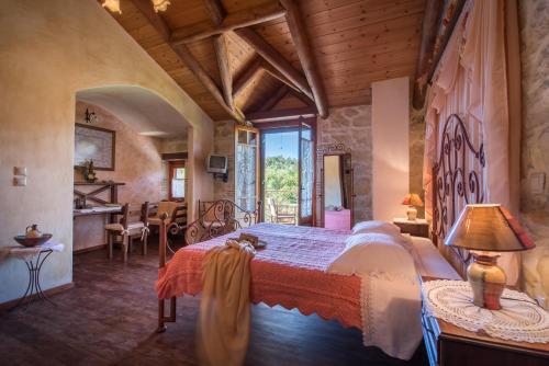 A bed or beds in a room at Ktima Kourou