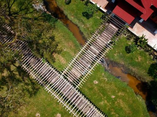 an overhead view of a pool of water in a yard at Bagas Zakariah Orchard Lodge in Gopeng