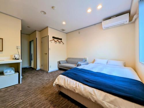 Katil atau katil-katil dalam bilik di Kanazawa Station Hotel