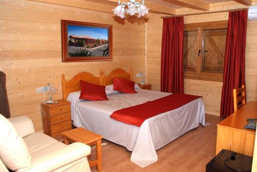 Postel nebo postele na pokoji v ubytování Motel San Isidro