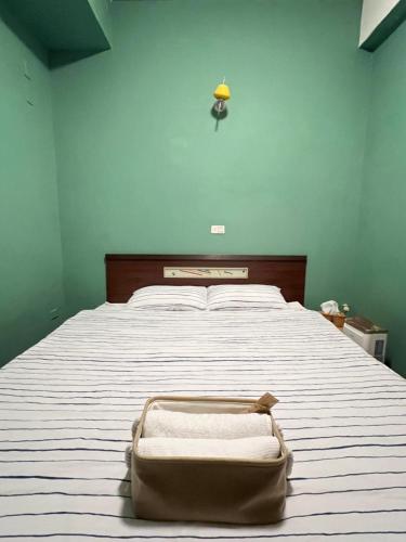 Postel nebo postele na pokoji v ubytování Wangs Hostel