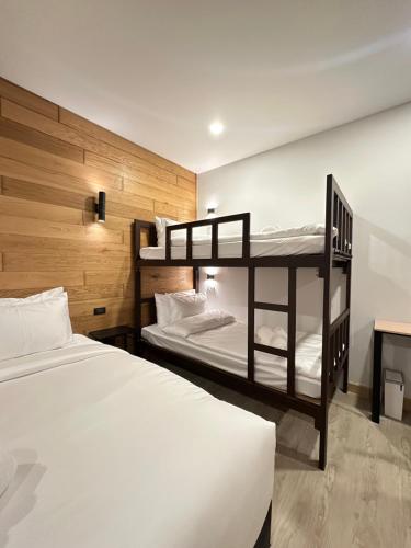 Ένα ή περισσότερα κρεβάτια σε δωμάτιο στο EbS Residence Chaweng