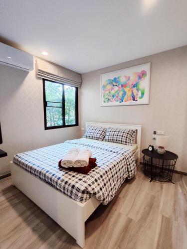Postel nebo postele na pokoji v ubytování Title Residencies Naiyang 2 Bedrooms PoolAccess