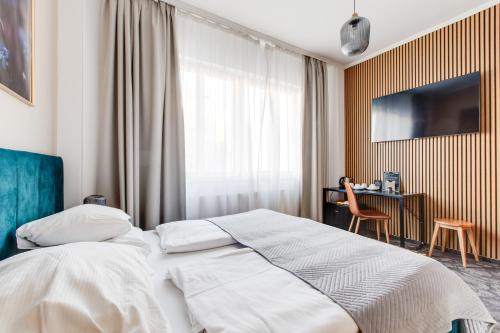 Hotel Andanteにあるベッド