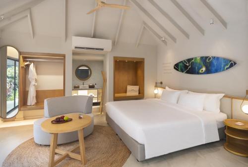 Voodi või voodid majutusasutuse Mercure Rayong Lomtalay Villas & Resort toas