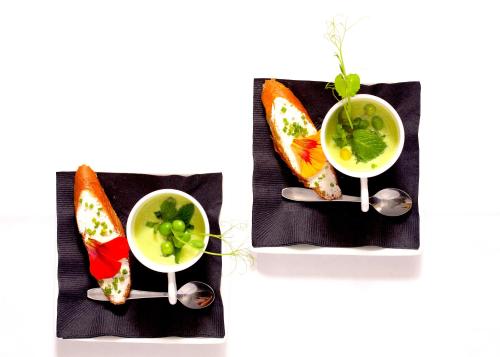 two plates with sandwiches and a bowl of soup at Atlanticview Cape Town Boutique Hotel in Cape Town