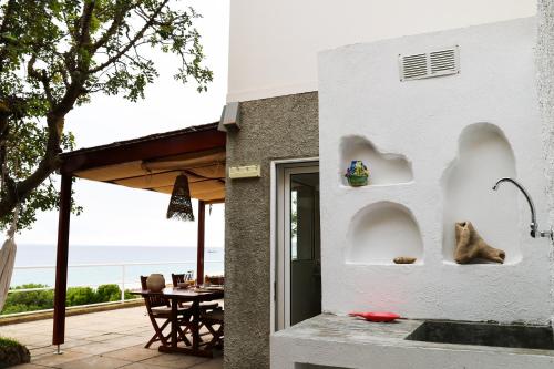 a house with a view of the ocean at Seashore Villa - Porto Santo in Porto Santo
