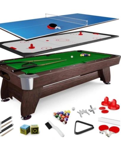 a snooker table with cues and playing equipment at B-Willa Słopnice basen & jacuzzi, sauna in Słopnice